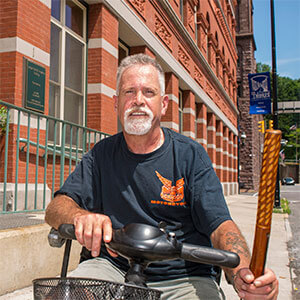 PHFA Rental Housing photo of a senior citizen living in a rental housing property renovated with funds from PHFA
